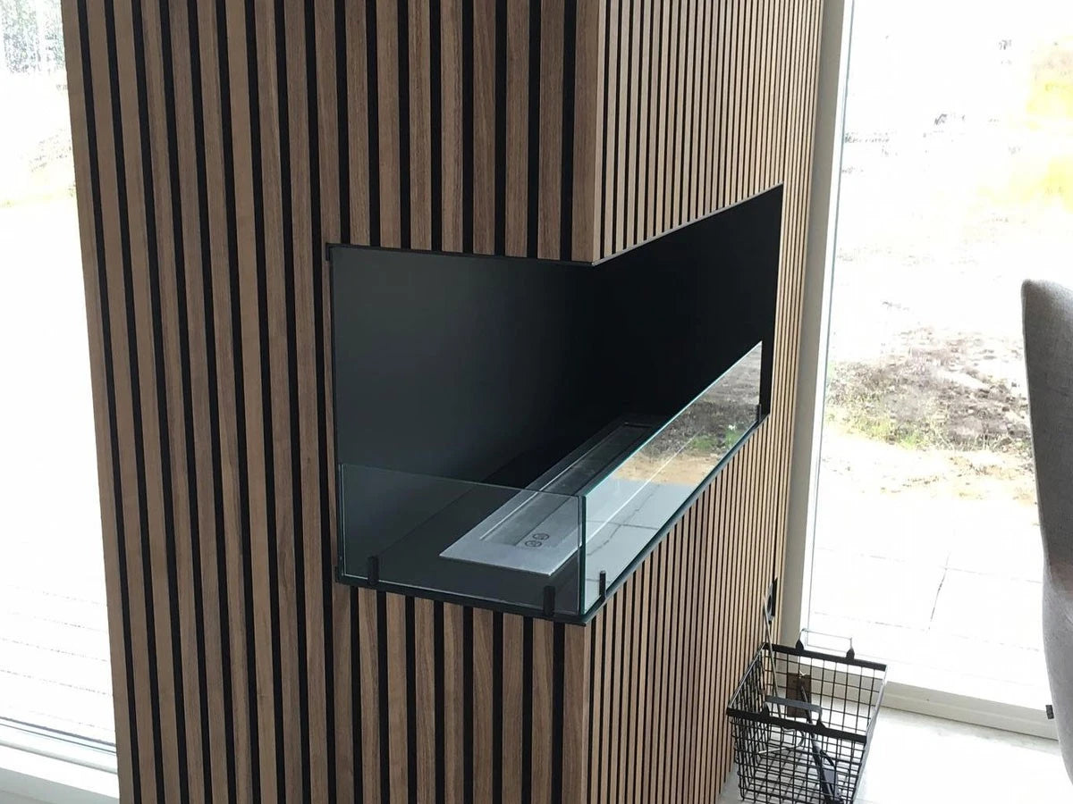 Foco Corner Left 800 installed in a wood-slat panelled corner wall, flame off
