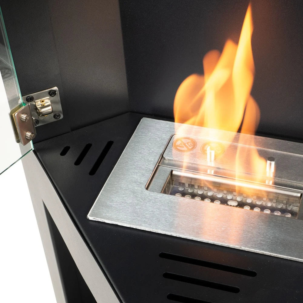 Close-up of the Alaska corner bioethanol stove's burner tray with lit flame