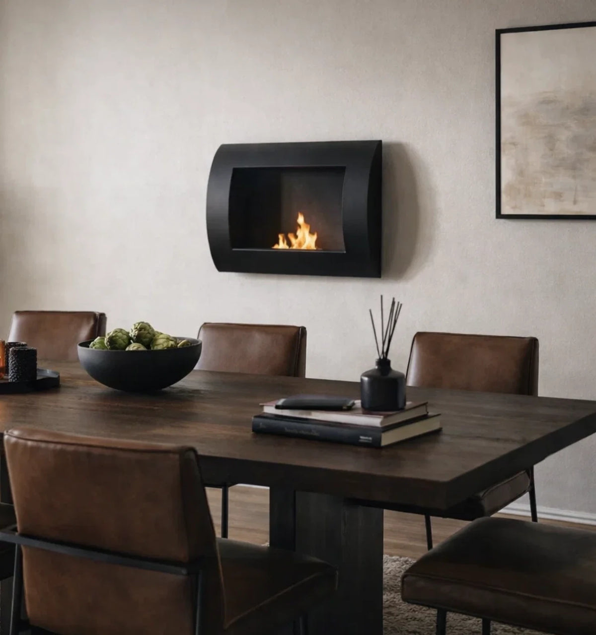Ocean black bio fireplace mounted above a dining table with leather chairs
