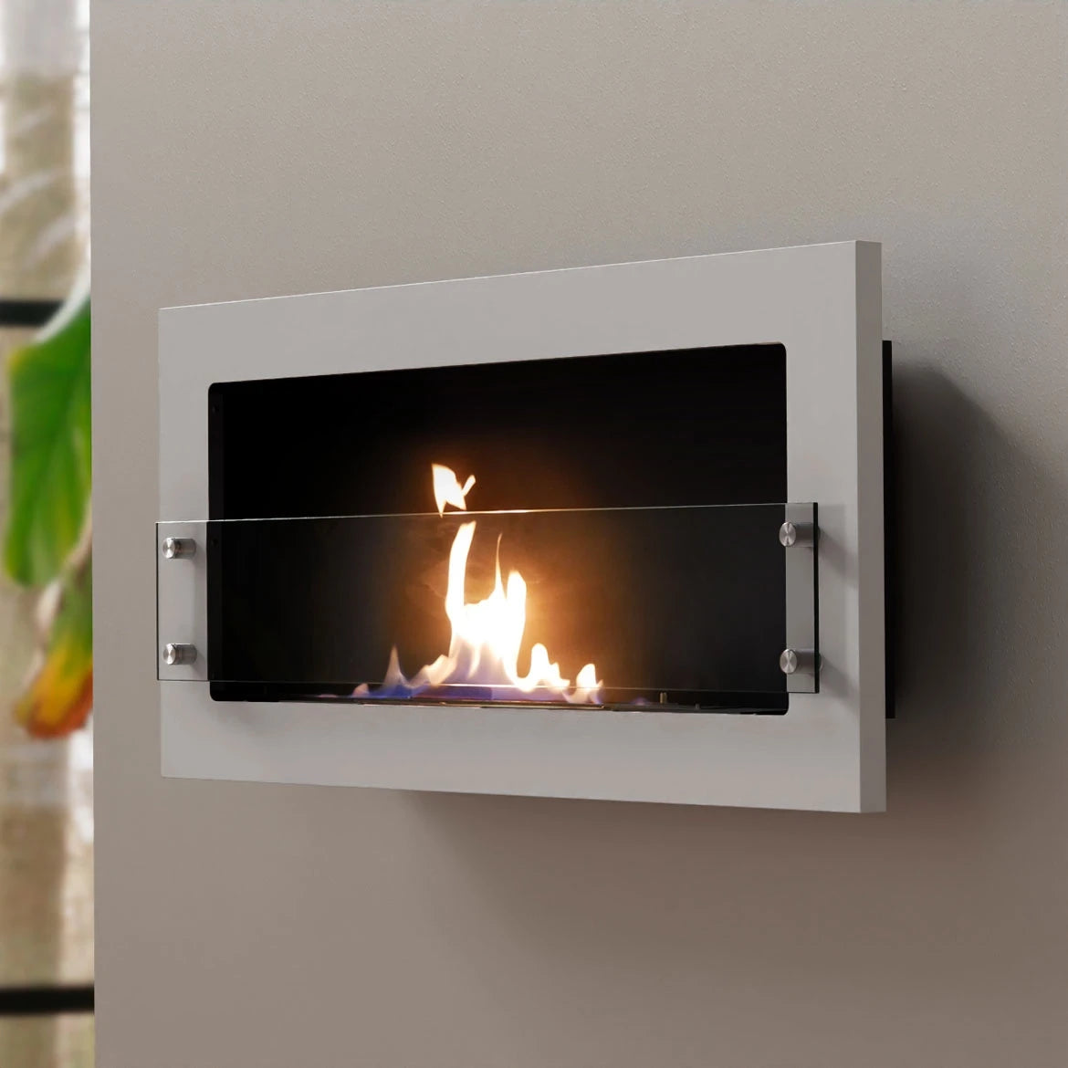 Texas white bioethanol fireplace mounted on a grey styled wall, angled view with a lit flame