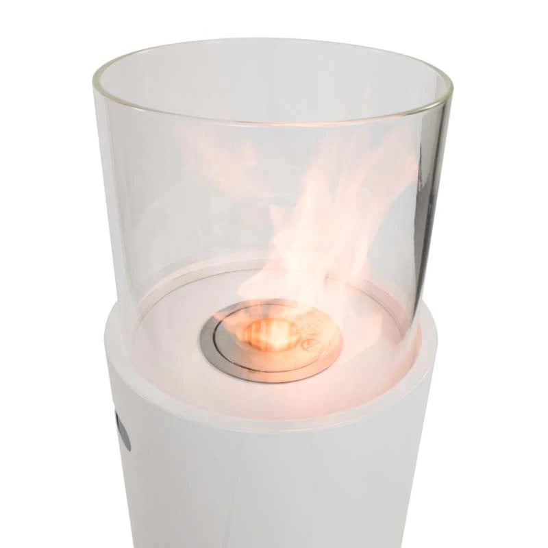 Outdoor white bioethanol fireplace, close-up of the lit spiral flame