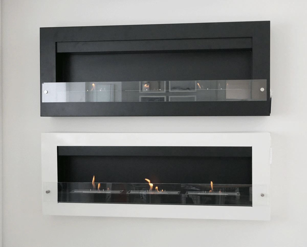 Black and white XL wall-mounted bioethanol fireplaces mounted side by side for comparison, front-facing showroom photo