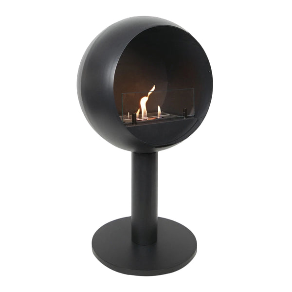Edmonton round freestanding bioethanol fireplace with lit flame, black powder-coated steel sphere on pedestal