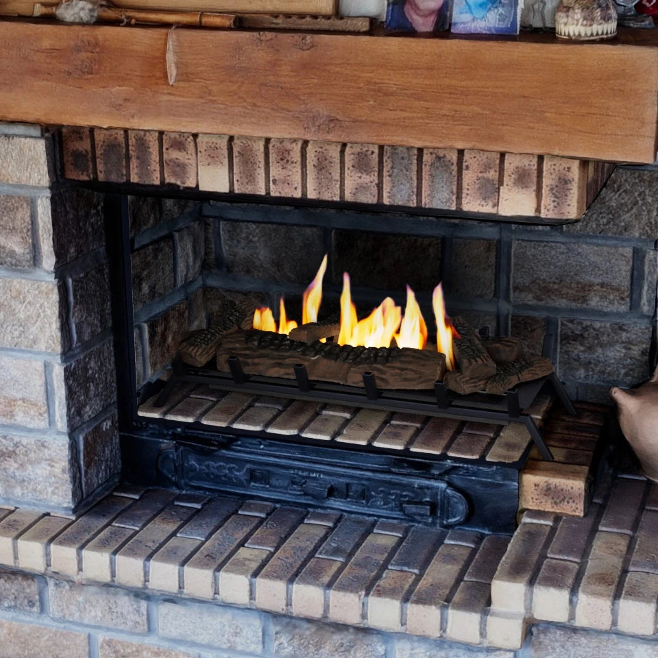 Close-up of the Grate XL bioethanol fire insert lit inside a real stone fireplace