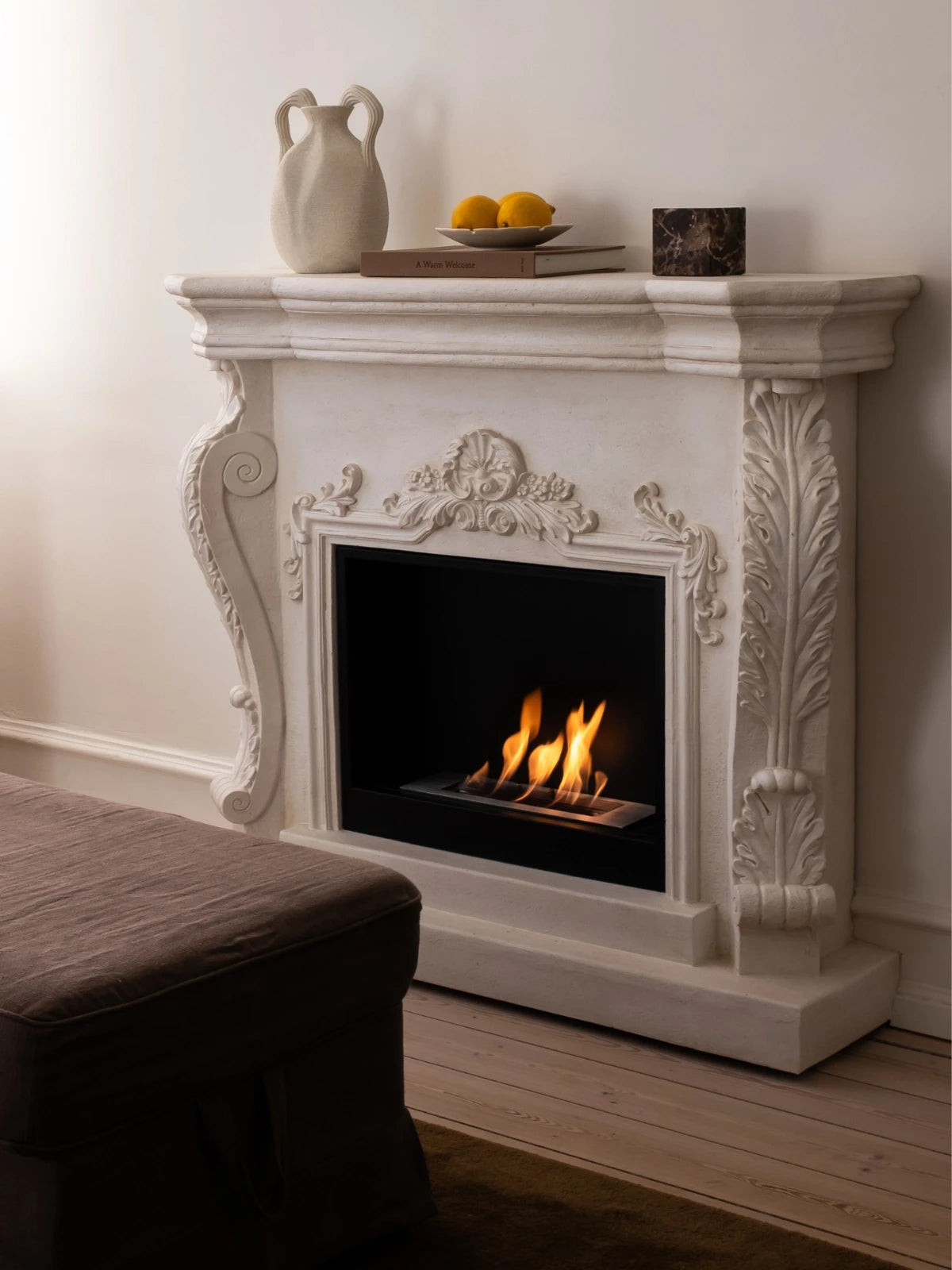 Ymir bioethanol fireplace styled in a neutral living room