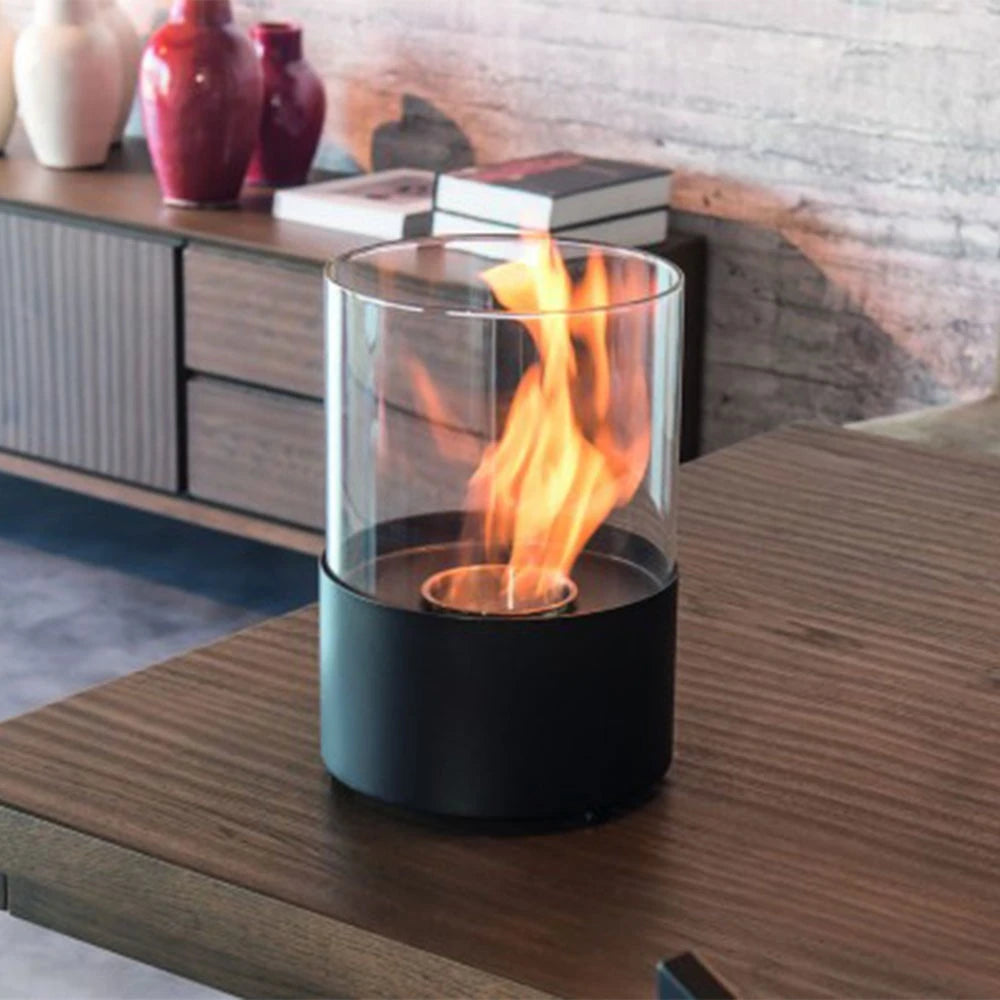 Kennington fireplace lit on a wooden sideboard-adjacent table in a modern interior