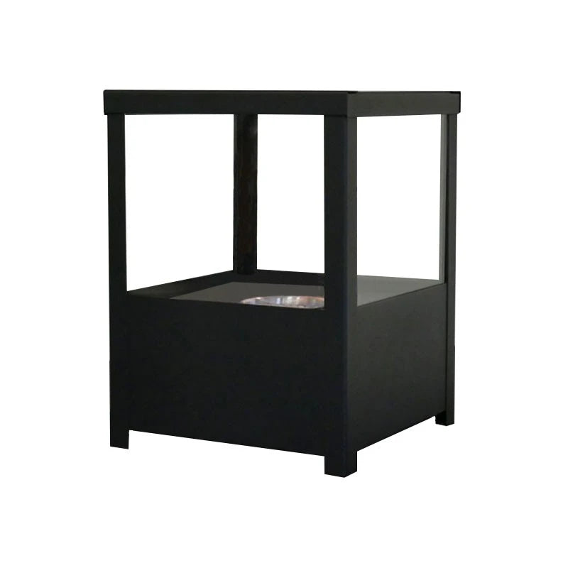 Square black tabletop bioethanol fireplace, unlit, white-background studio angle view