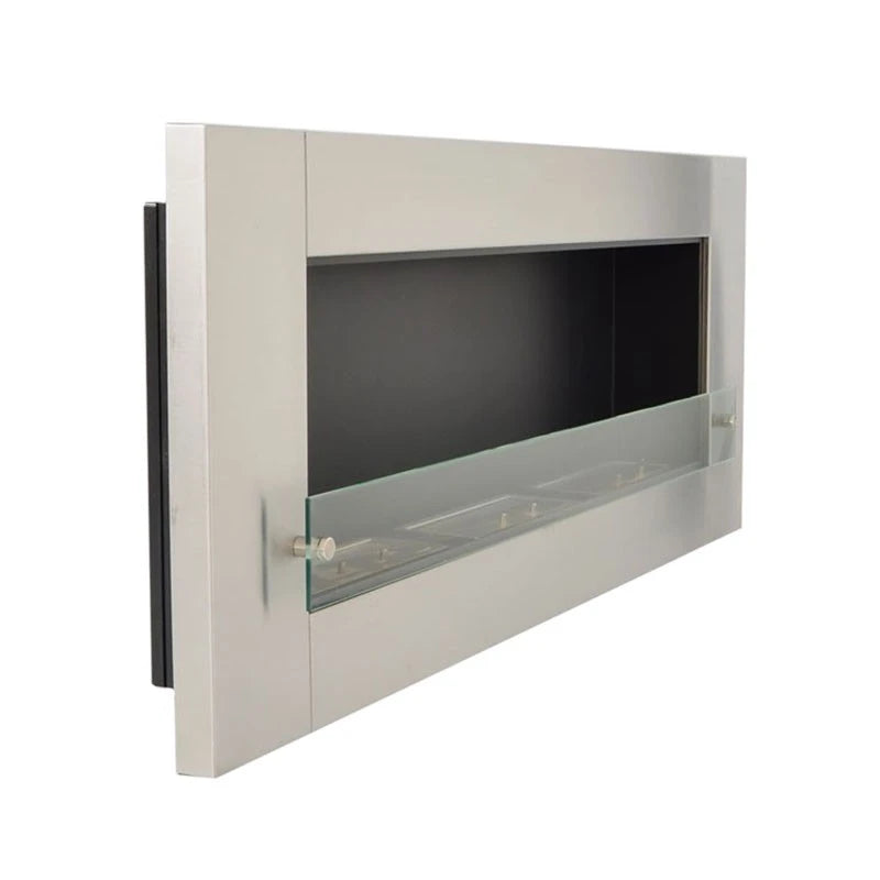 XL stainless steel wall-mounted bioethanol fireplace, angled view showing the safety glass panel and triple-burner detail, unlit studio photo