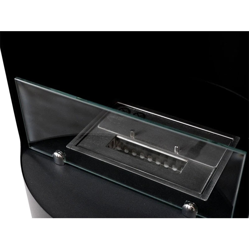 Close-up of the Montgomery bioethanol fireplace's burner tray and safety glass