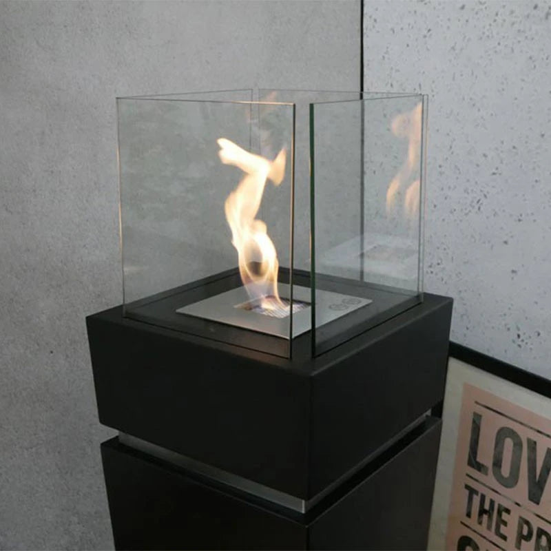 Close-up of the lit flame in the Elegant black bioethanol fireplace's glass top