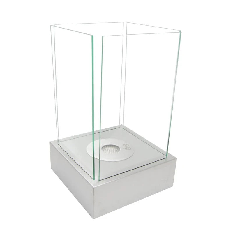 Hydro steel bioethanol fireplace, unlit, showing the burner and glass panel construction