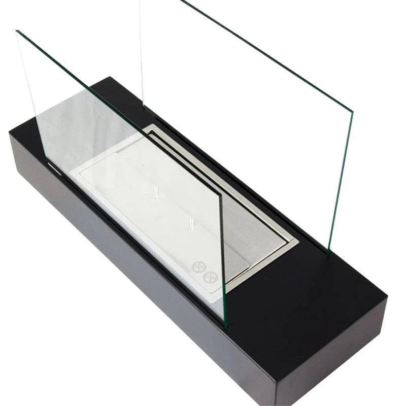Oklahoma black steel bioethanol fireplace, unlit, showing the burner construction from above