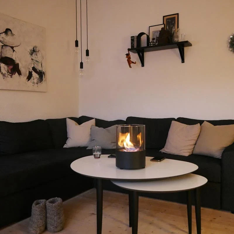 Kennington fireplace lit on a coffee table in a cozy living room in the evening, genuine customer photo