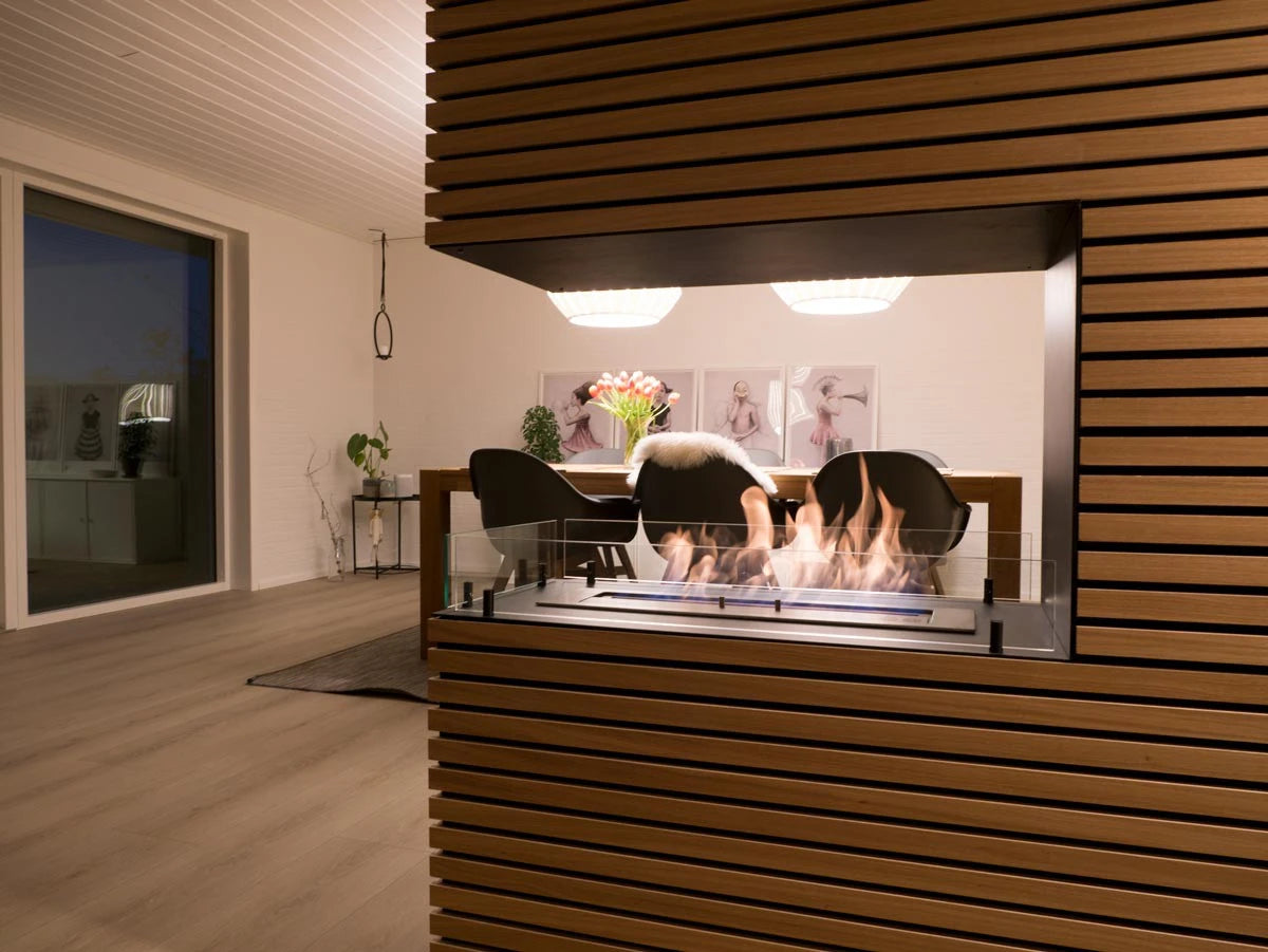 Foco Room Divider 800 room-divider wall with wood slats in a dining nook, lit ethanol flame