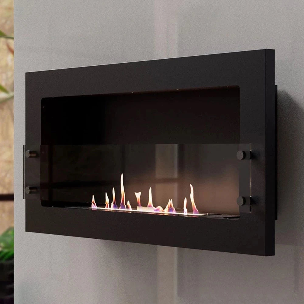 Texas black bioethanol fireplace mounted on a grey styled wall, opposite angled render with a lit flame