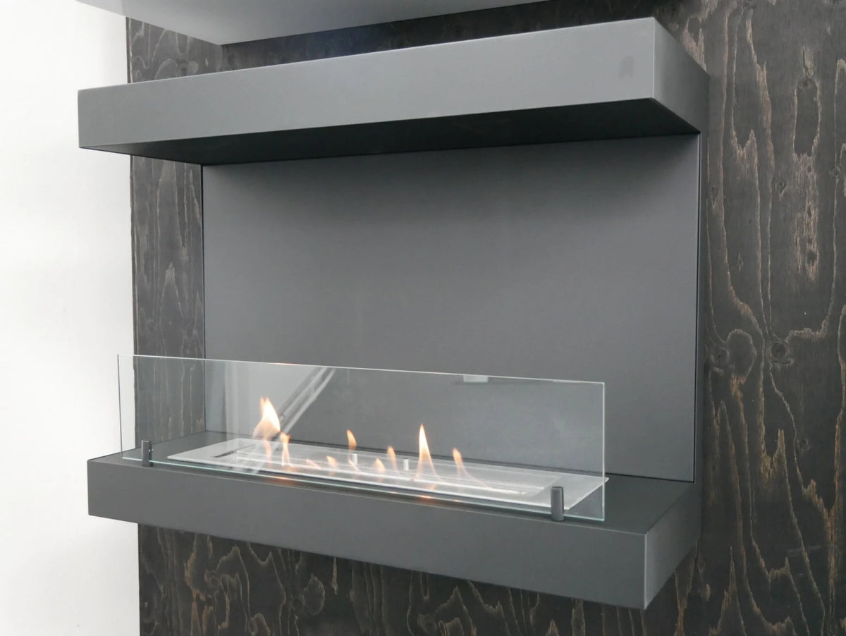 Dakota black three-sided bio fireplace mounted on a dark wood-panelled wall, lit flame